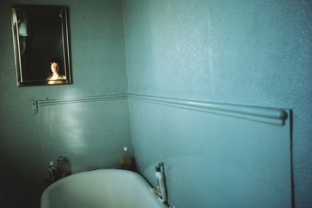 Self-portrait in blue bathroom, London
