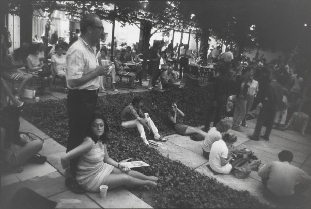 Untitled (People gathered in MOMA's outdoor courtyard, at night)