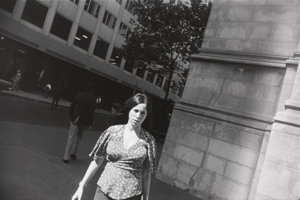 Untitled (Woman in floral top walking towards the camera)