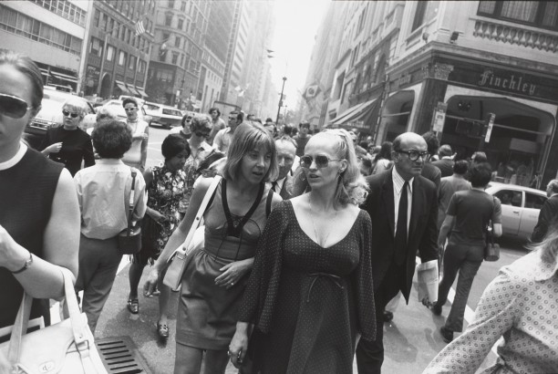 Untitled (Two women talking as they cross a busy street in Manhattan)